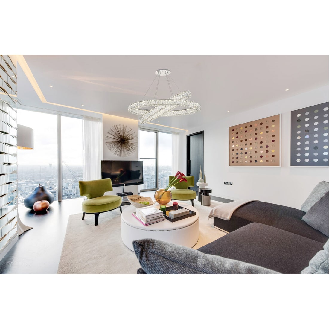 Monroe 48 Inch LED Chrome Oval Crystal Chandelier: Monroe 48 Inch LED Chrome Oval Crystal Chandelier Elevate your interior decor with this stunning 48-inch modern oval chandelier, perfect for illuminating kitchens, dining rooms, and more. Featuring a