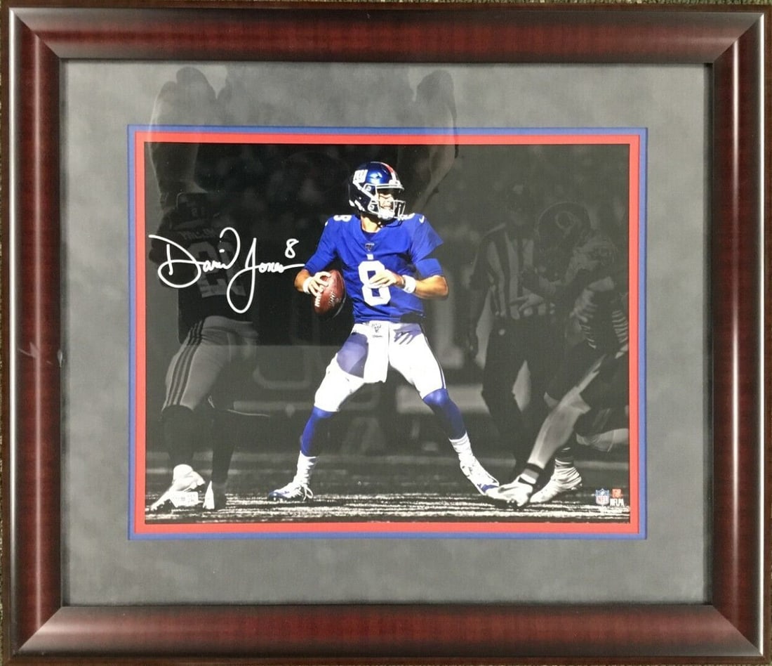 Daniel Jones Signed 11x14 Framed Giants Photo with Fanatics Authentication: Daniel Jones Signed 11x14 Framed Giants Photo with Fanatics Authentication This stunning 11x14 photograph of Daniel Jones, the talented quarterback for the New York Giants, is a must-have for any foot