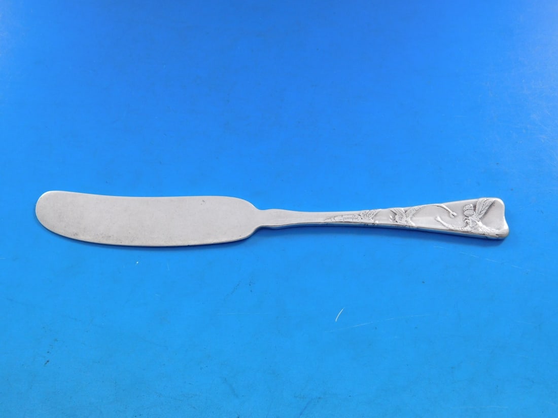 Tiffany & Co. 6" Sterling Silver Dragonfly Butter Spreader Acid Etched: Tiffany & Co. 6" Sterling Silver Dragonfly Butter Spreader Acid Etched This exquisite butter spreader is crafted from sterling silver and features the elegant Lap Over Edge Acid Etched pattern by Tiff