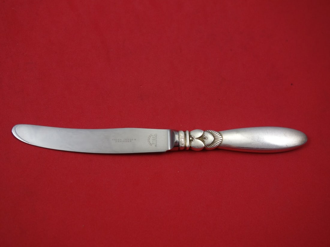 Georg Jensen Cactus Sterling Silver Fruit Knife 6 3/4 inches: Georg Jensen Cactus Sterling Silver Fruit Knife 6 3/4 inches Experience the elegance of the Cactus fruit knife by Georg Jensen, a stunning piece crafted from sterling silver. This knife features a hol