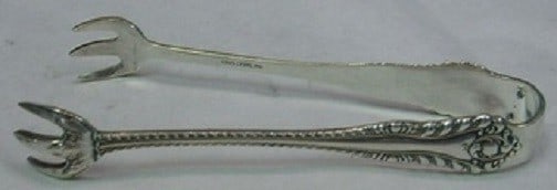 Mazarin Pattern Sterling Silver Sugar Tong by Dominick & Haff 4 Inch: Mazarin Pattern Sterling Silver Sugar Tong by Dominick & Haff 4 Inch This exquisite sugar tong, crafted by Dominick & Haff, showcases the elegant Mazarin pattern. Made from high-quality sterling silve