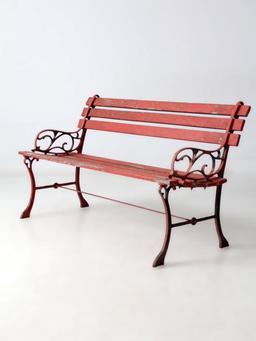 1930s Painted Wood and Sculpted Ironwork Outdoor Bench 48 Inch Wide: 1930s Painted Wood and Sculpted Ironwork Outdoor Bench 48 Inch Wide This vintage garden bench from the 1930s-1940s features sculptural ironwork paired with painted wood slats, creating a welcoming and