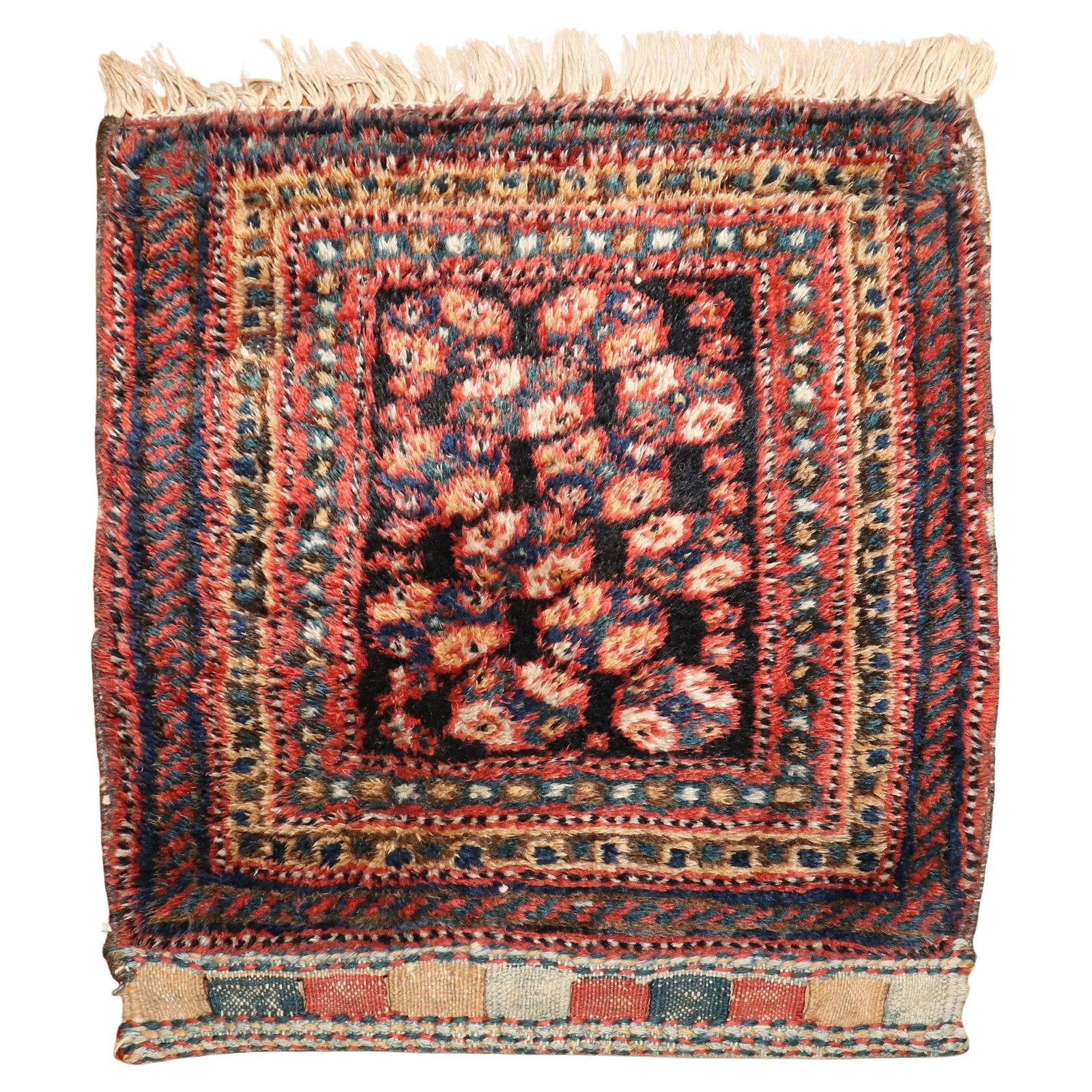 Persian Kurd Tribal Bagface Wool Rug Early 20th Century 16 x 18 in: Persian Kurd Tribal Bagface Wool Rug Early 20th Century 16 x 18 in This exquisite Persian Kurd Bagface Rug showcases the rich tribal style and craftsmanship of early 20th-century Iran. Measuring 16 in