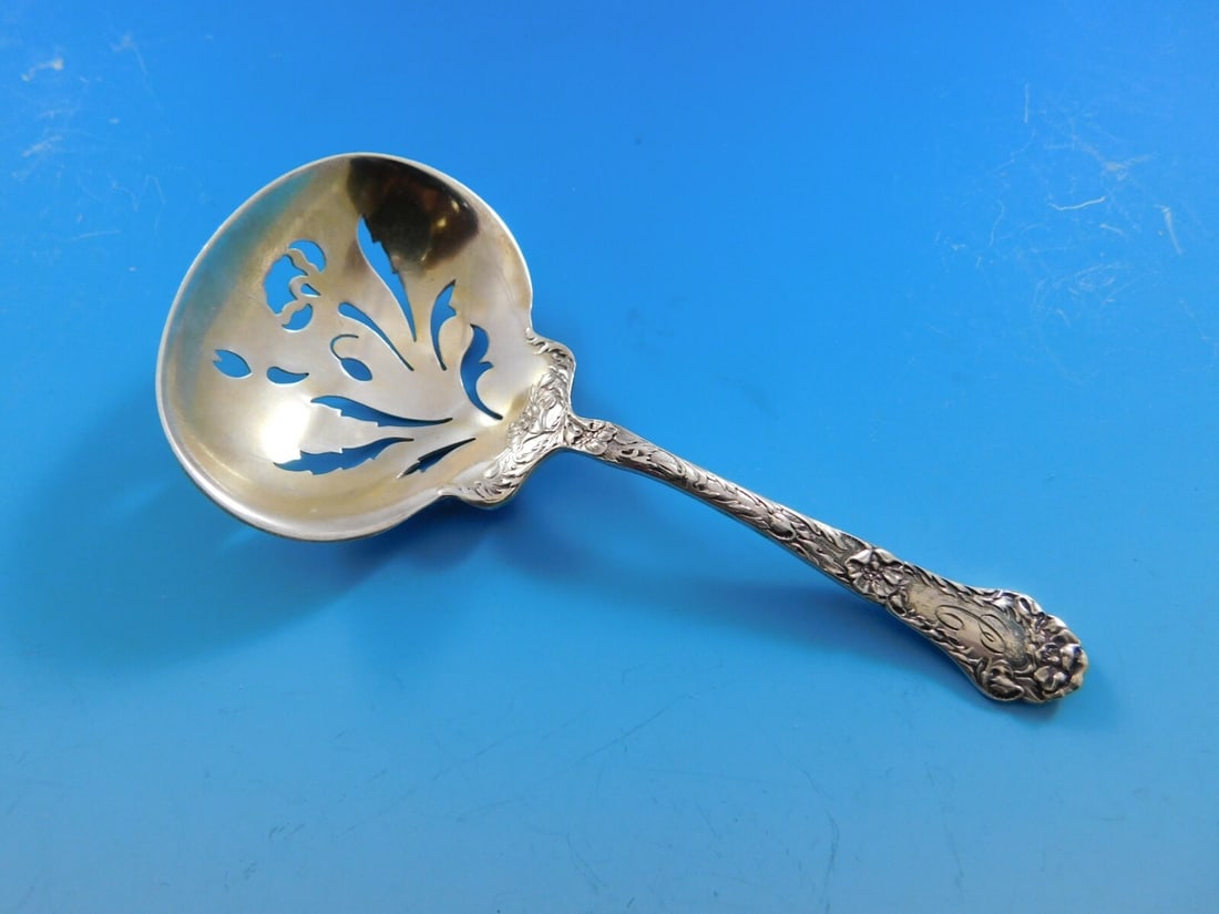 Gorham Poppy Pattern Sterling Silver Gold Washed Nut Spoon 4.5": Gorham Poppy Pattern Sterling Silver Gold Washed Nut Spoon 4.5" This exquisite nut spoon is part of the Poppy pattern by Gorham, crafted from high-quality sterling silver with a beautiful gold wash fi