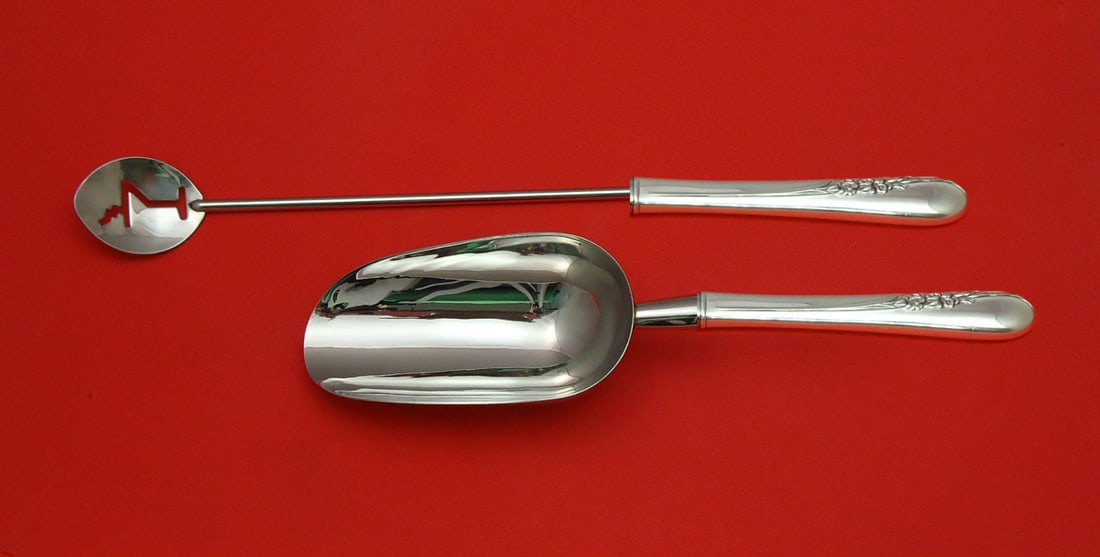 International Sterling Silver Blossom Time 2pc Bar Set: International Sterling Silver Blossom Time 2pc Bar Set Enhance your serving experience with this exquisite Blossom Time 2-piece bar set by International Sterling. Crafted from sterling silver with cus