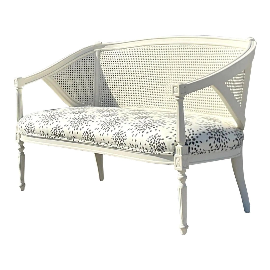 Vintage Regency Cane Settee with Albert Hadley Fireworks Upholstery: Vintage Regency Cane Settee with Albert Hadley Fireworks Upholstery This exquisite vintage Regency settee features a chic cane back frame upholstered in the stunning Albert Hadley "Fireworks" fabric,