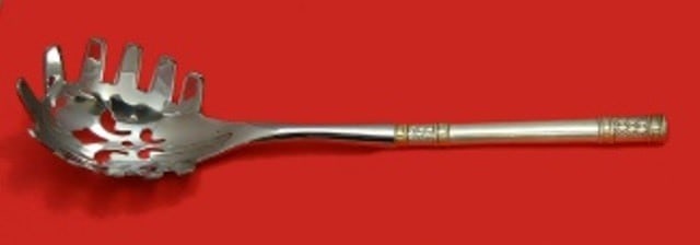 Wallace Aegean Weave Gold Sterling Silver Pasta Server 11 Inch: Wallace Aegean Weave Gold Sterling Silver Pasta Server 11 Inch This exquisite Aegean Weave Gold pasta server by Wallace is a stunning addition to any dining collection. Crafted from fine sterling silv