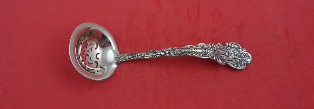 Gorham Versailles Sterling Silver Sugar Sifter Ladle 5.75": Gorham Versailles Sterling Silver Sugar Sifter Ladle 5.75" Introducing the exquisite Versailles sugar sifter ladle by Gorham, crafted from high-quality sterling silver. This elegant ladle measures 5 3