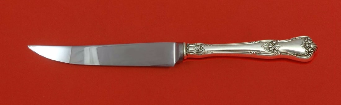 Memory Lane Lunt Sterling Silver Custom Steak Knife 8.5": Memory Lane Lunt Sterling Silver Custom Steak Knife 8.5" Introducing the Memory Lane Sterling Silver Steak Knife, a custom-made piece by Lunt. This exquisite knife features a serrated stainless steel