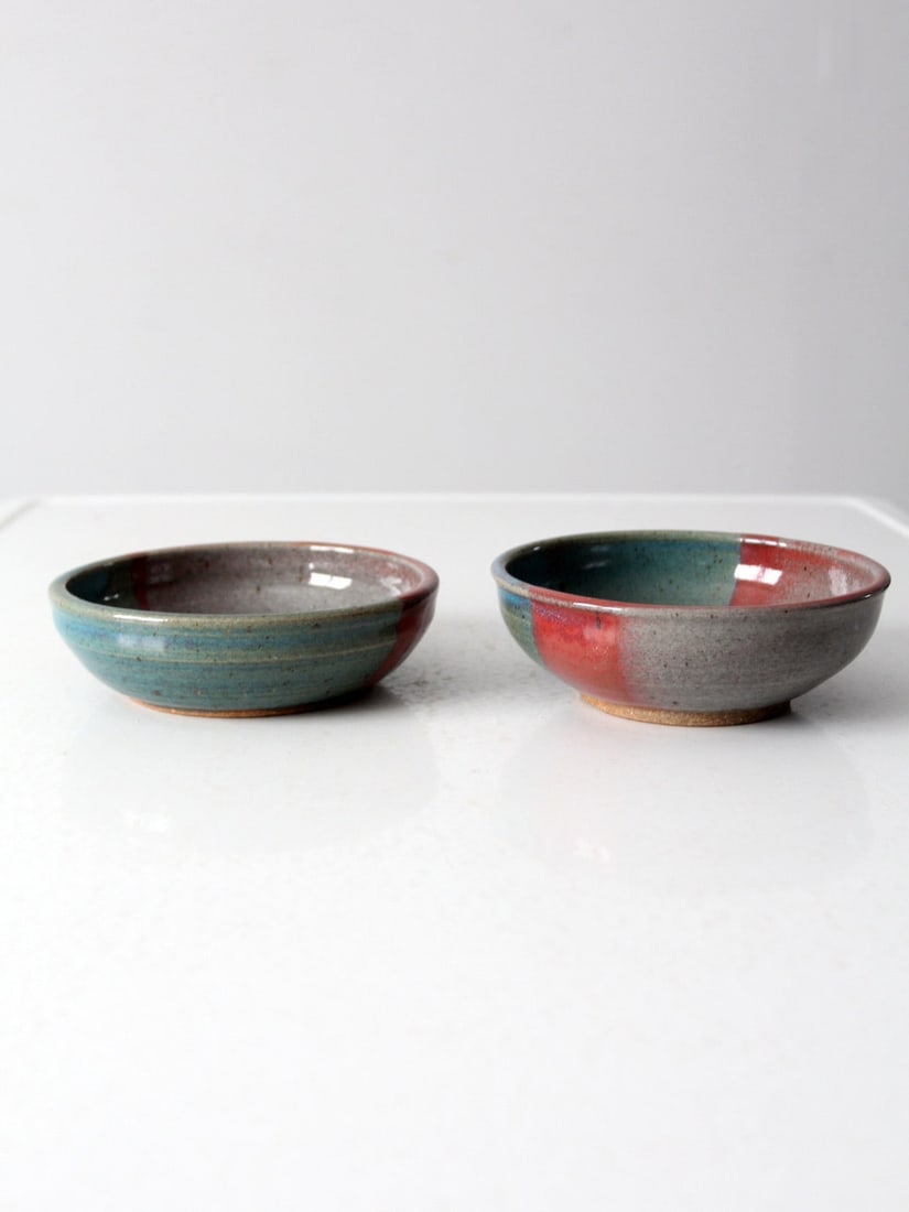 Gina Romano Vintage Studio Pottery Bowls Pair Turquoise Raspberry Glaze: Gina Romano Vintage Studio Pottery Bowls Pair Turquoise Raspberry Glaze This pair of vintage studio pottery bowls showcases the artistic craftsmanship of Gina Romano. Each handmade bowl features a str