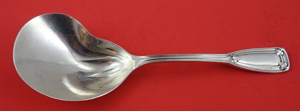 Tiffany & Co. Saint Dunstan Sterling Silver Conch Berry Spoon 9 3/8": Tiffany & Co. Saint Dunstan Sterling Silver Conch Berry Spoon 9 3/8" This exquisite berry spoon from the renowned Tiffany & Co. features the elegant Saint Dunstan pattern. Crafted from high-quality st