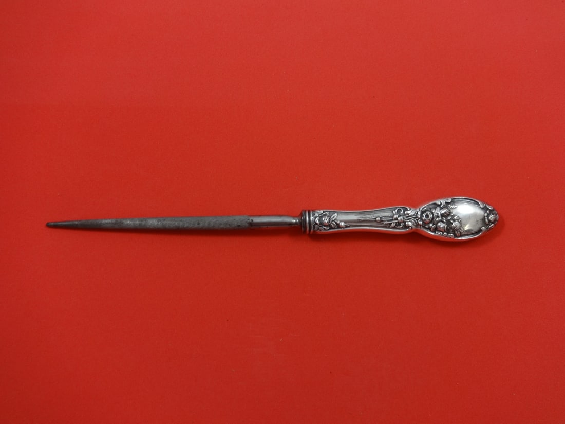 Alvin Brides Bouquet Silverplate Steak Carving Hone 9 5/8": Alvin Brides Bouquet Silverplate Steak Carving Hone 9 5/8" This exquisite steak carving hone is crafted from silverplate by Alvin in the elegant 'Brides Bouquet' pattern. Featuring a hollow handle and