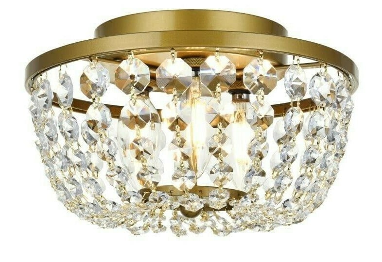 Cora 3 Light Brass and Clear Crystal Flush Mount Chandelier 10 Inch: Cora 3 Light Brass and Clear Crystal Flush Mount Chandelier 10 Inch This modern flush mount chandelier features three lights and a striking combination of brass and clear finishes with royal cut cryst