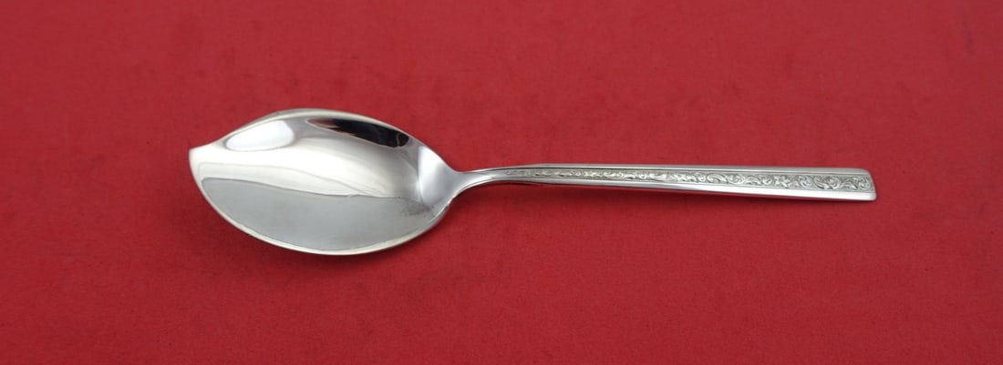 Gorham Trilogy Sterling Silver Jelly Server 6 3/8": Gorham Trilogy Sterling Silver Jelly Server 6 3/8" This exquisite jelly server is crafted from sterling silver and features the elegant Trilogy pattern by Gorham. With a length of 6 3/8 inches, it is