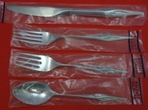 Wallace Still Mood Sterling Silver 4-Piece Place Setting: Wallace Still Mood Sterling Silver 4-Piece Place Setting Enhance your dining experience with this exquisite 4-piece place setting in the Still Mood pattern by Wallace. Crafted from high-quality sterli