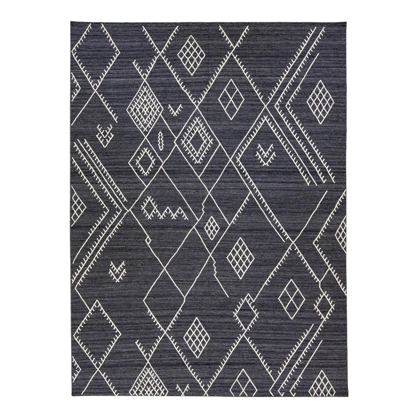Nantucket Collection Charcoal Wool Kilim Rug 10'2 x 13'9: Nantucket Collection Charcoal Wool Kilim Rug 10'2 x 13'9 This stunning kilim rug from the Nantucket collection features a rich gray-charcoal field adorned with striking white accents. Handcrafted from