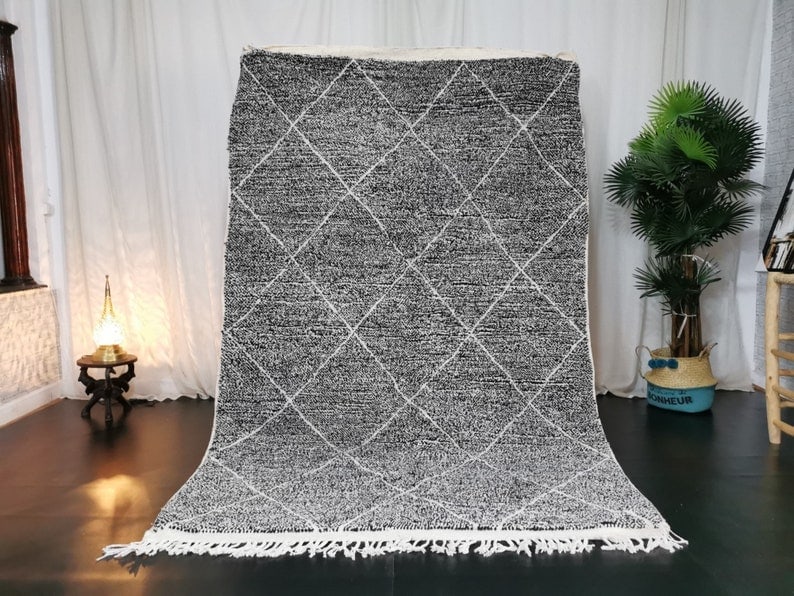 Handmade Moroccan Berber Wool Rug 8 x 5 Feet Geometric Design: Handmade Moroccan Berber Wool Rug 8 x 5 Feet Geometric Design Discover the beauty of this stunning handmade Moroccan Berber wool rug, featuring a stylish white geometric pattern. Skillfully handwoven