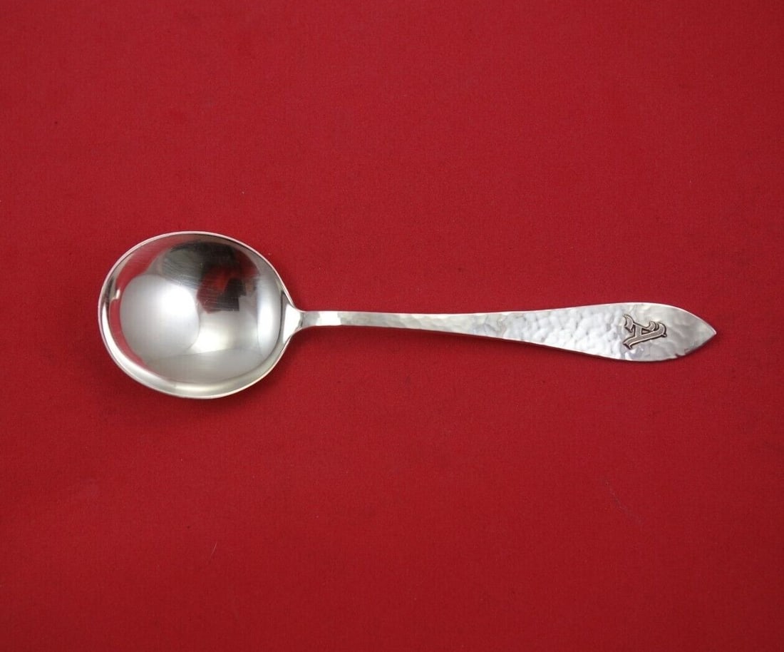 Shreve Antique Hammered Sterling Silver Cream Soup Spoon Monogram A: Shreve Antique Hammered Sterling Silver Cream Soup Spoon Monogram A This exquisite Antique Hammered Cream Soup Spoon, crafted by Shreve, showcases a stunning design in sterling silver. Measuring 5 7/8