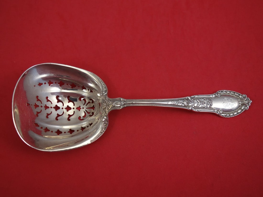 Gorham Tuileries Sterling Silver Pea Spoon 8.5 Inch Serving Utensil: Gorham Tuileries Sterling Silver Pea Spoon 8.5 Inch Serving Utensil This exquisite Tuileries pea spoon by Gorham is crafted from high-quality sterling silver, measuring 8 1/2 inches. The spoon feature