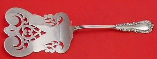 Reed and Barton Majestic Sterling Silver Pierced Asparagus Server 9 3/4 inches: Reed and Barton Majestic Sterling Silver Pierced Asparagus Server 9 3/4 inches Enhance your dining experience with the exquisite Majestic Asparagus Server from Reed & Barton. Crafted from sterling sil