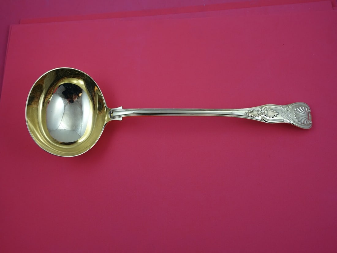 Antique Kings English Sterling Silver Soup Ladle Vermeil London 1889 13 1/4": Antique Kings English Sterling Silver Soup Ladle Vermeil London 1889 13 1/4" Discover this exquisite Kings English Sterling Silver Soup Ladle, intricately crafted with vermeil gold wash. This stunning