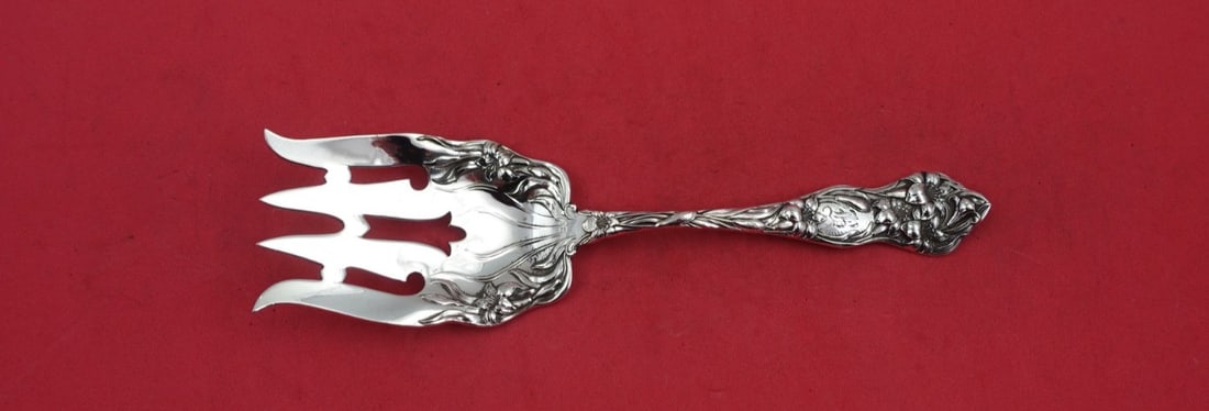 Watson Lily Sterling Silver Serving Fork with Floral Design 6 5/8": Watson Lily Sterling Silver Serving Fork with Floral Design 6 5/8" This exquisite serving fork is part of the "Lily" pattern by Watson, crafted from high-quality sterling silver. Featuring elegant flo
