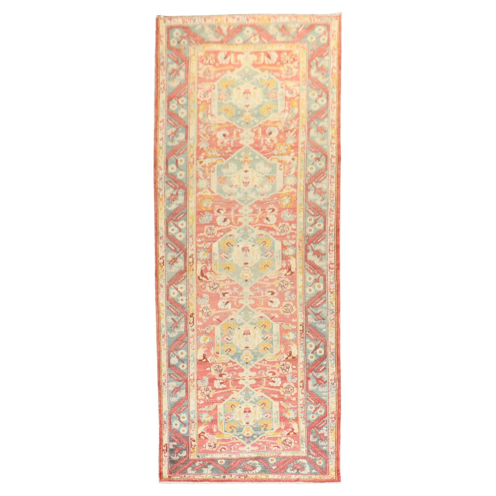Early 20th Century Wide Turkish Ghiordes Runner Rug Floral Wool: Early 20th Century Wide Turkish Ghiordes Runner Rug Floral Wool This is an early 20th-century Turkish Ghiordes wide runner featuring a floral design. Hand-woven from wool, this pre-owned rug exemplifi