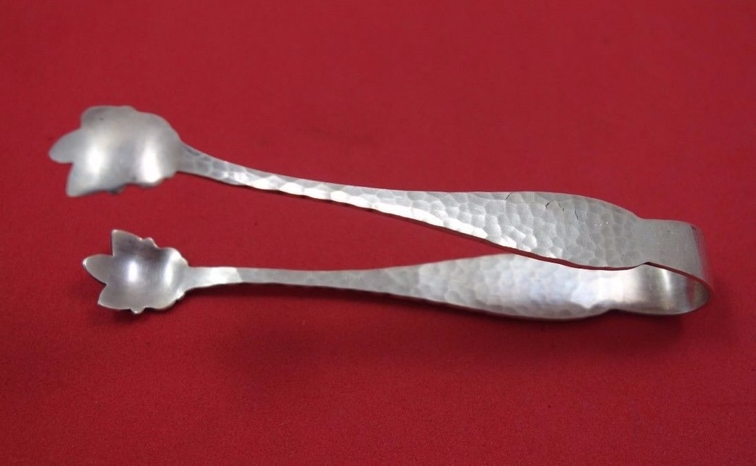 International Sterling Silver Van Dyke Sugar Tong 4 Inch Serving Piece: International Sterling Silver Van Dyke Sugar Tong 4 Inch Serving Piece This exquisite Van Dyke sugar tong, crafted from sterling silver, is a beautiful serving piece perfect for any table setting. Mea