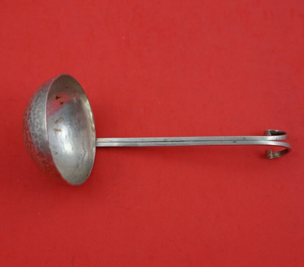 Helen & Karl Peters 7" Handmade Sterling Silver Gravy Ladle: Helen & Karl Peters 7" Handmade Sterling Silver Gravy Ladle This exquisite gravy ladle, measuring 7 inches, is handmade and hand hammered from sterling silver by renowned artisans Helen and Karl Peter