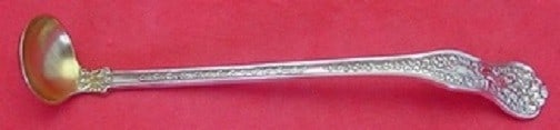 Tiffany & Co Olympian Sterling Silver Mustard Ladle Goldwashed 5.5": Tiffany & Co Olympian Sterling Silver Mustard Ladle Goldwashed 5.5" This exquisite mustard ladle from Tiffany & Co. is crafted from high-quality sterling silver and features a timeless design from the