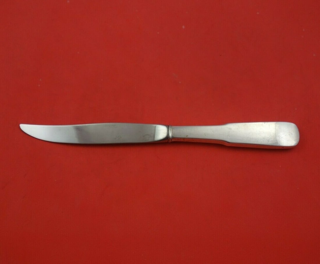 International Sterling Silver Steak Knife Eighteen Ten 1810 8 1/4": International Sterling Silver Steak Knife Eighteen Ten 1810 8 1/4" This Eighteen Ten 1810 steak knife by International is a stunning piece crafted from sterling silver, featuring a hollow handle and a