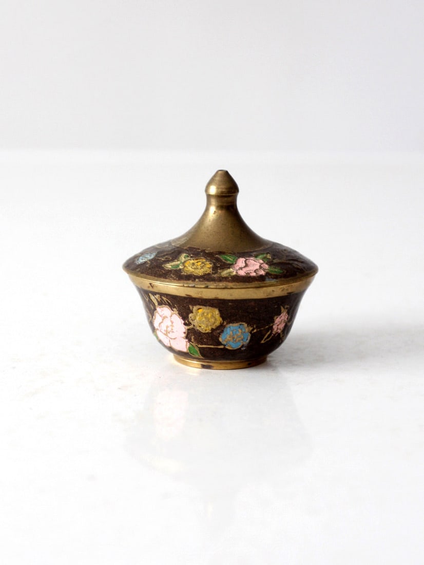 Vintage Cloisonne Lidded Dish with Floral Design 2.5 Inch: Vintage Cloisonne Lidded Dish with Floral Design 2.5 Inch This vintage cloisonne small covered dish showcases exquisite enameled florals in vibrant shades of pink, yellow, blue, and green against a sl