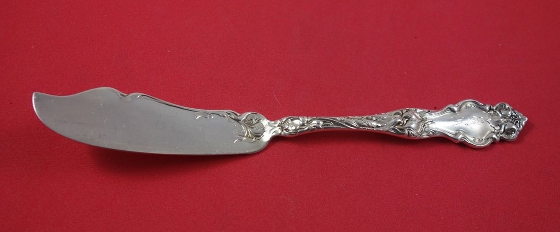 Wallace Eton Sterling Silver Master Butter Knife Flat Handle 7.5": Wallace Eton Sterling Silver Master Butter Knife Flat Handle 7.5" This exquisite Eton by Wallace master butter knife features a flat handle design, measuring 7 1/2 inches in length. Crafted from high-