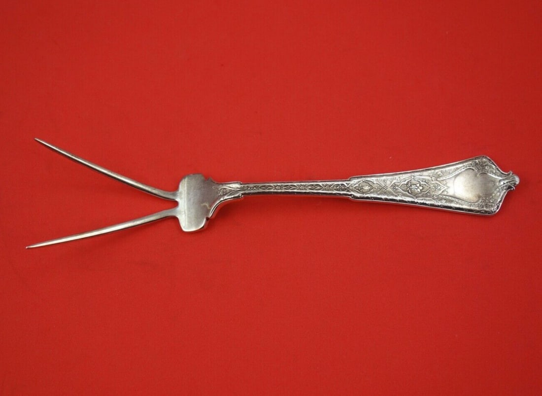 Tiffany & Co. Persian Sterling Silver Baked Potato Fork 8 inch: Tiffany & Co. Persian Sterling Silver Baked Potato Fork 8 inch Discover the elegance of the Persian pattern by Tiffany & Co. with this exquisite Sterling Silver Baked Potato Fork. Crafted between 1850