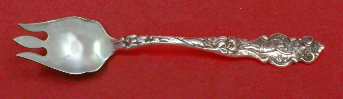 Wallace Irian Sterling Silver Custom Ice Cream Spork 6 Inch: Wallace Irian Sterling Silver Custom Ice Cream Spork 6 Inch Enhance your dining experience with this exquisite Irian ice cream spork, crafted by Wallace in sterling silver. Measuring 6 inches, this cu