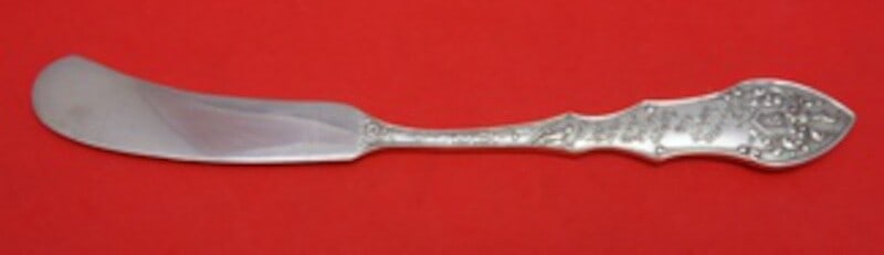 Shiebler Linnet Sterling Silver Butter Spreader 6 1/4" with Quote: Shiebler Linnet Sterling Silver Butter Spreader 6 1/4" with Quote This exquisite butter spreader from the Linnet pattern by Shiebler is crafted from sterling silver, showcasing a flat handle adorned w