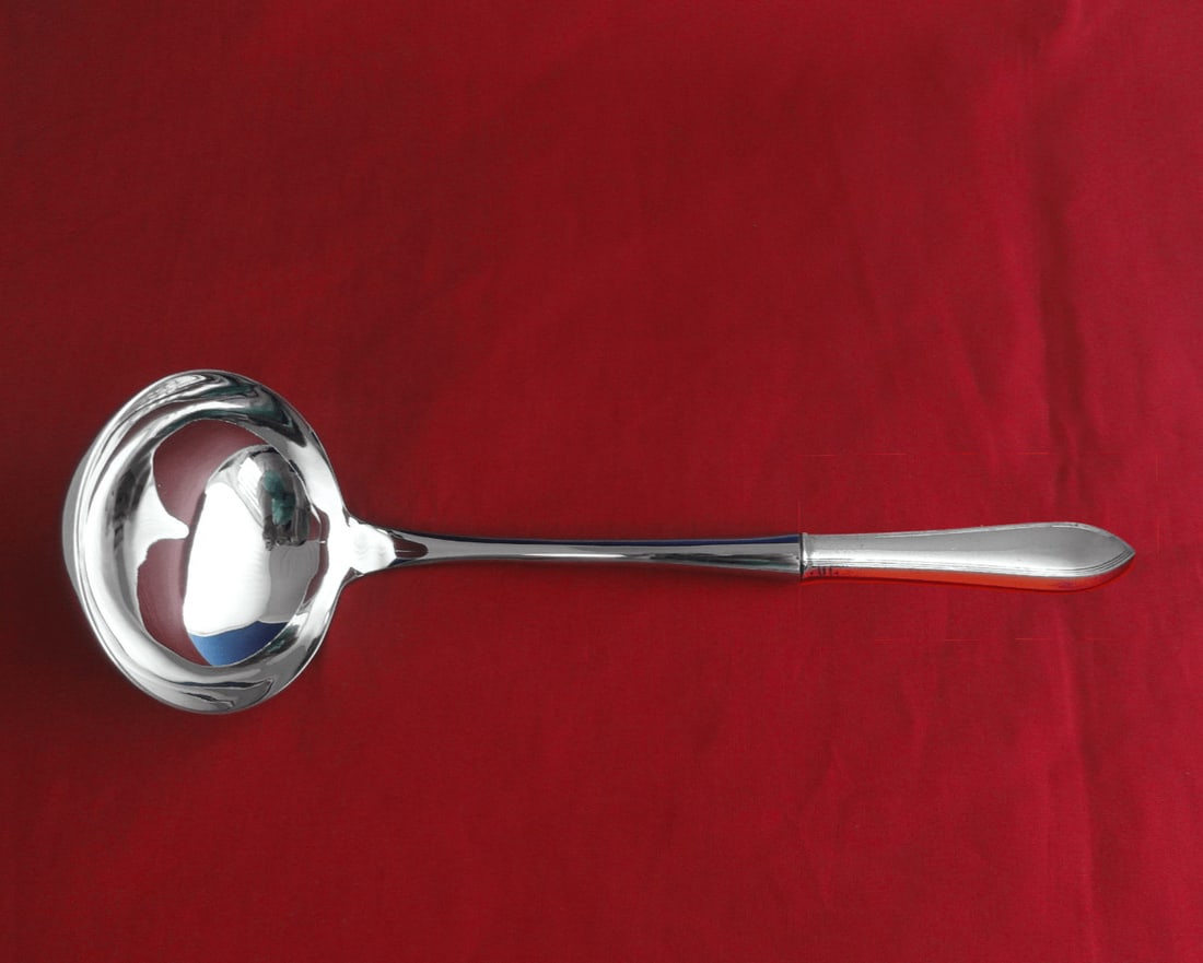 Tiffany & Co Reeded Edge Sterling Silver Soup Ladle 10 1/2" Custom Made: Tiffany & Co Reeded Edge Sterling Silver Soup Ladle 10 1/2" Custom Made This impressive soup ladle from Tiffany & Co. features the elegant Reeded Edge pattern. Crafted from high-quality sterling silve