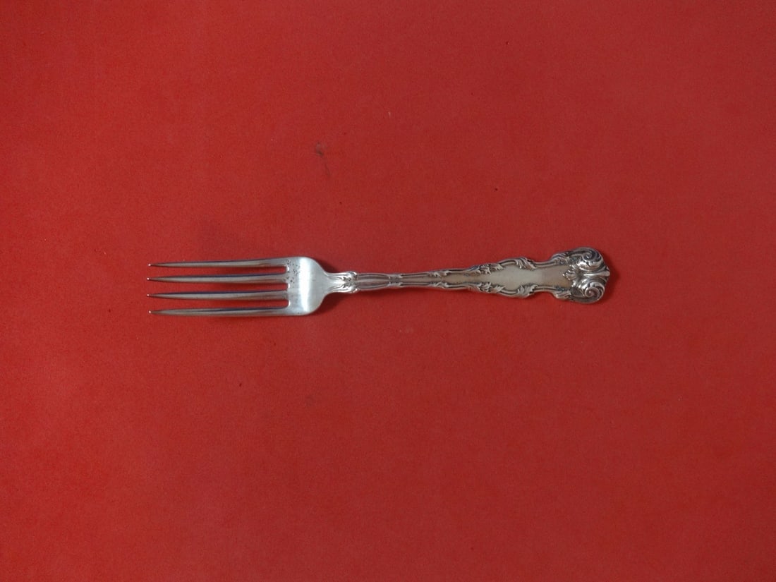 Dominick & Haff Victoria Sterling Silver Dinner Fork 7 5/8": Dominick & Haff Victoria Sterling Silver Dinner Fork 7 5/8" This elegant dinner fork features the exquisite Victoria pattern by Dominick & Haff, crafted from high-quality sterling silver. With a lengt