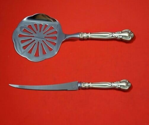 Chantilly Gorham Sterling Silver Tomato Serving Set 2-Piece Custom Hostess: Chantilly Gorham Sterling Silver Tomato Serving Set 2-Piece Custom Hostess Elevate your dining experience with this exquisite 2-piece Tomato Serving Set from the Chantilly pattern by Gorham. Crafted f