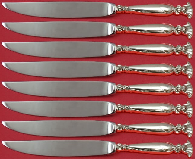 Wallace Romance of the Sea Sterling Silver 8pc Steak Knife Set: Wallace Romance of the Sea Sterling Silver 8pc Steak Knife Set Experience elegance at your dining table with this set of 8 steak knives from the Romance of the Sea pattern by Wallace. Crafted with ste