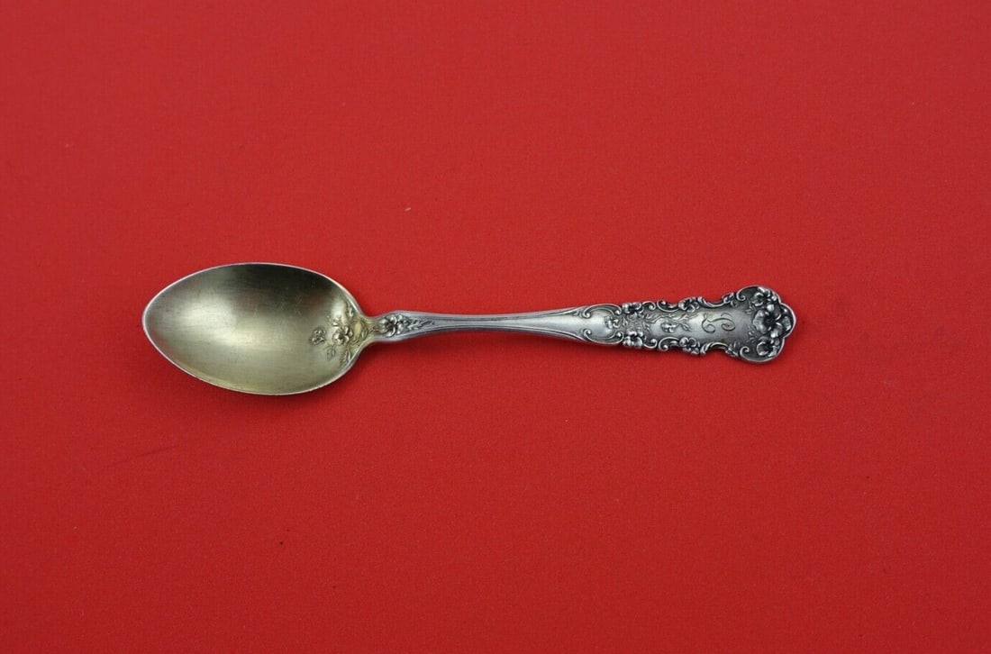 International Silver Pansy Gold Washed Demitasse Spoon 4.5": International Silver Pansy Gold Washed Demitasse Spoon 4.5" This exquisite Pansy demitasse spoon by International Sterling Silver is a charming addition to your collection. Crafted from high-quality s