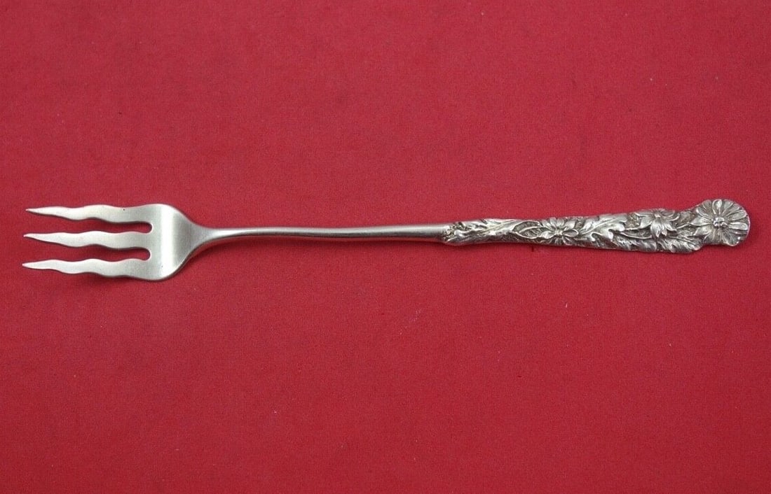 Gorham Number 24 Sterling Silver Cocktail Fork Wavy Tines 5 1/8 in: Gorham Number 24 Sterling Silver Cocktail Fork Wavy Tines 5 1/8 in This exquisite cocktail fork features a wavy tine design and is crafted from high-quality sterling silver. Made by Gorham, this piece