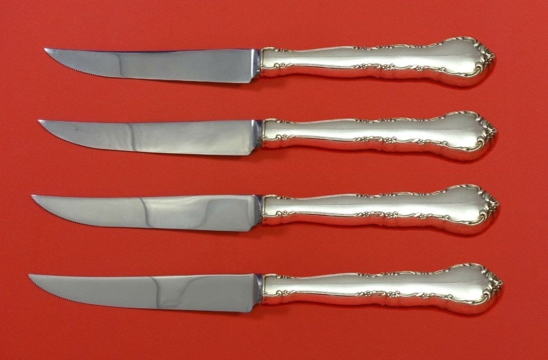 Lunt Mignonette Sterling Silver Steak Knife Set 4pc Custom Made 8.5": Lunt Mignonette Sterling Silver Steak Knife Set 4pc Custom Made 8.5" Enhance your dining experience with this exquisite 4-piece steak knife set from Lunt, crafted in the elegant Mignonette pattern. Ea