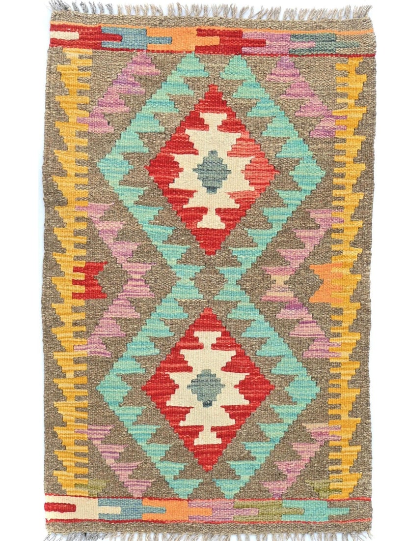 Handwoven Wool Geometric Kilim Rug Multicolored Reversible 2x3 Entryway Accent: Handwoven Wool Geometric Kilim Rug Multicolored Reversible 2x3 Entryway Accent This small reversible tribal Kilim rug features a multicolored geometric pattern and is hand-woven from wool. Its flat pi