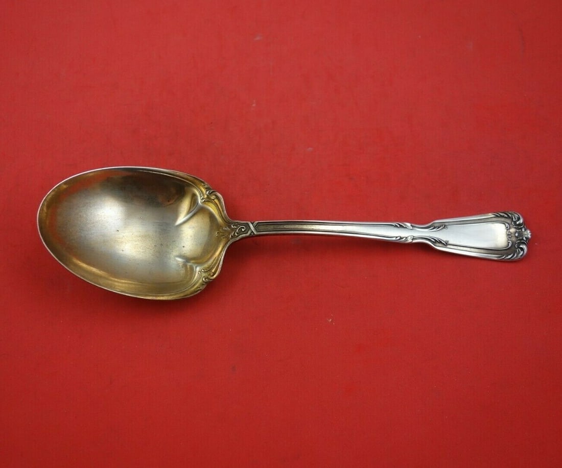 Reed and Barton Chambord Sterling Silver Berry Spoon 9 Gold Wash: Reed and Barton Chambord Sterling Silver Berry Spoon 9 Gold Wash This exquisite Chambord berry spoon is crafted by Reed and Barton from sterling silver, showcasing the elegant Chambord pattern. Measur