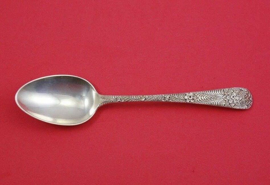 Tiffany & Co Antique Engraved Sterling Silver Soup Spoon 7 1/8": Tiffany & Co Antique Engraved Sterling Silver Soup Spoon 7 1/8" This exquisite place soup spoon, crafted by Tiffany & Co., showcases the timeless elegance of sterling silver in the Antique Engraved pa