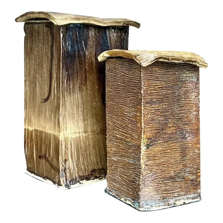 Set of 2 Vintage Boho Square Lidded Pottery Vases: Set of 2 Vintage Boho Square Lidded Pottery Vases Enhance your decor with this charming set of 2 vintage Boho studio pottery square lidded vases. Perfect for both displaying and storing items, these v