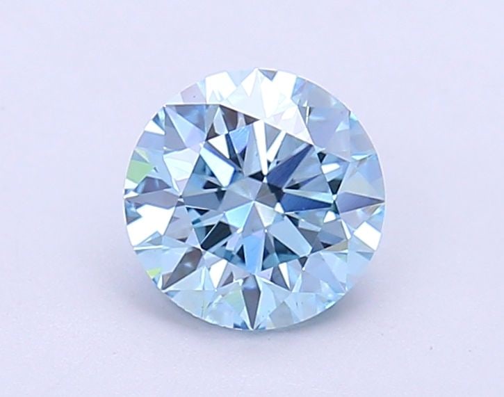 Ideal Loose Diamond - ROUND 1.1ct Fancy Vivid Blue VS2: Ideal Loose Diamond - ROUND 1.1ct Fancy Vivid Blue VS2 Source: This is a real non-mined Diamond that has been grown in a lab Shape: ROUND Carats: 1.1 Color: Fancy Vivid Blue Certification: IGI Video: