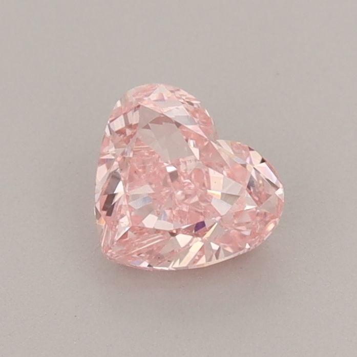 Loose Diamond - HEART 0.6ct Fancy Vivid Pink VS1: Loose Diamond - HEART 0.6ct Fancy Vivid Pink VS1 Source: This is a real non-mined Diamond that has been grown in a lab Shape: HEART Carats: 0.6 Color: Fancy Vivid Pink Certification: IGI Video: