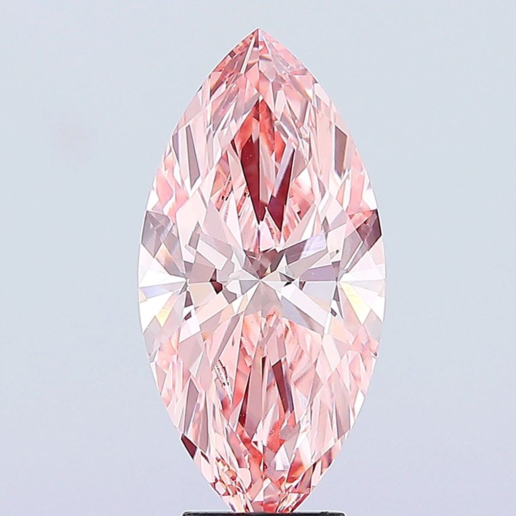 Loose Diamond - MARQUISE 5.06ct Fancy Vivid Pink VVS2: Loose Diamond - MARQUISE 5.06ct Fancy Vivid Pink VVS2 Source: This is a real non-mined Diamond that has been grown in a lab Shape: MARQUISE Carats: 5.06 Color: Fancy Vivid Pink Certification: IGI Vide